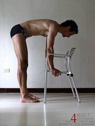 If you can't reach the floor doing a standing forward bend, then use a chair. Neil Keleher. Sensational Yoga Poses.