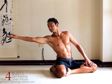 bharadvajasana variation, seated side bend.