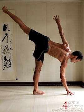 half moon pose, weight between hand and foot.