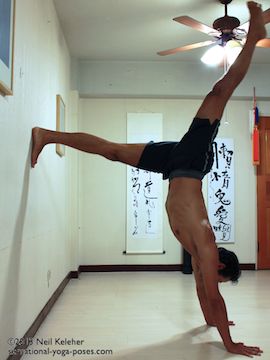 swing a leg up while doing l shaped handstand using a wall, Neil Keleher, Sensational Yoga Poses