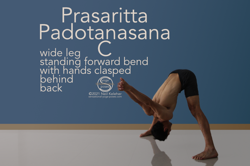 Wide leg forward bend with hands clasped behind the back. In this standing forward bend you can try using your hip flexors to deepen your forward bend and stretch your hip flexors. Neil Keleher, Sensational Yoga Poses.