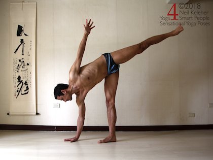 Half moon yog pose with hand on the floor. Neil Keleher. Sensational Yoga Poses.